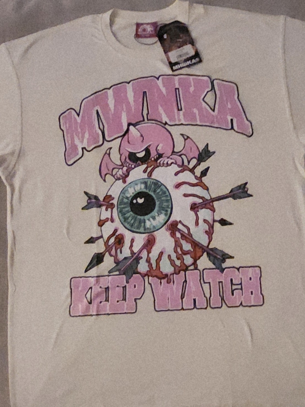 Mishka Cream Short-Sleeve Graphic Tee with Pink Print